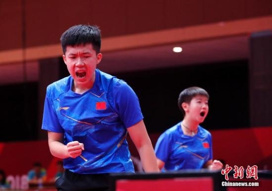 資料圖：雅加達(dá)亞運(yùn)會(huì)，王楚欽/孫穎莎奪得混雙冠軍。 <a target='_blank' href='/'>中新社</a>記者 劉關(guān)關(guān) 攝