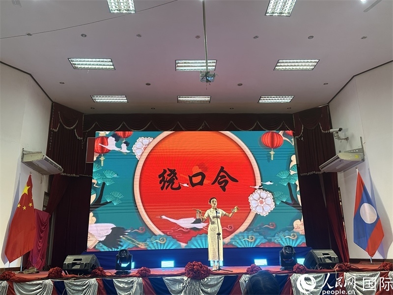 圖片：老撾選手進(jìn)行才藝表演。孫廣勇攝