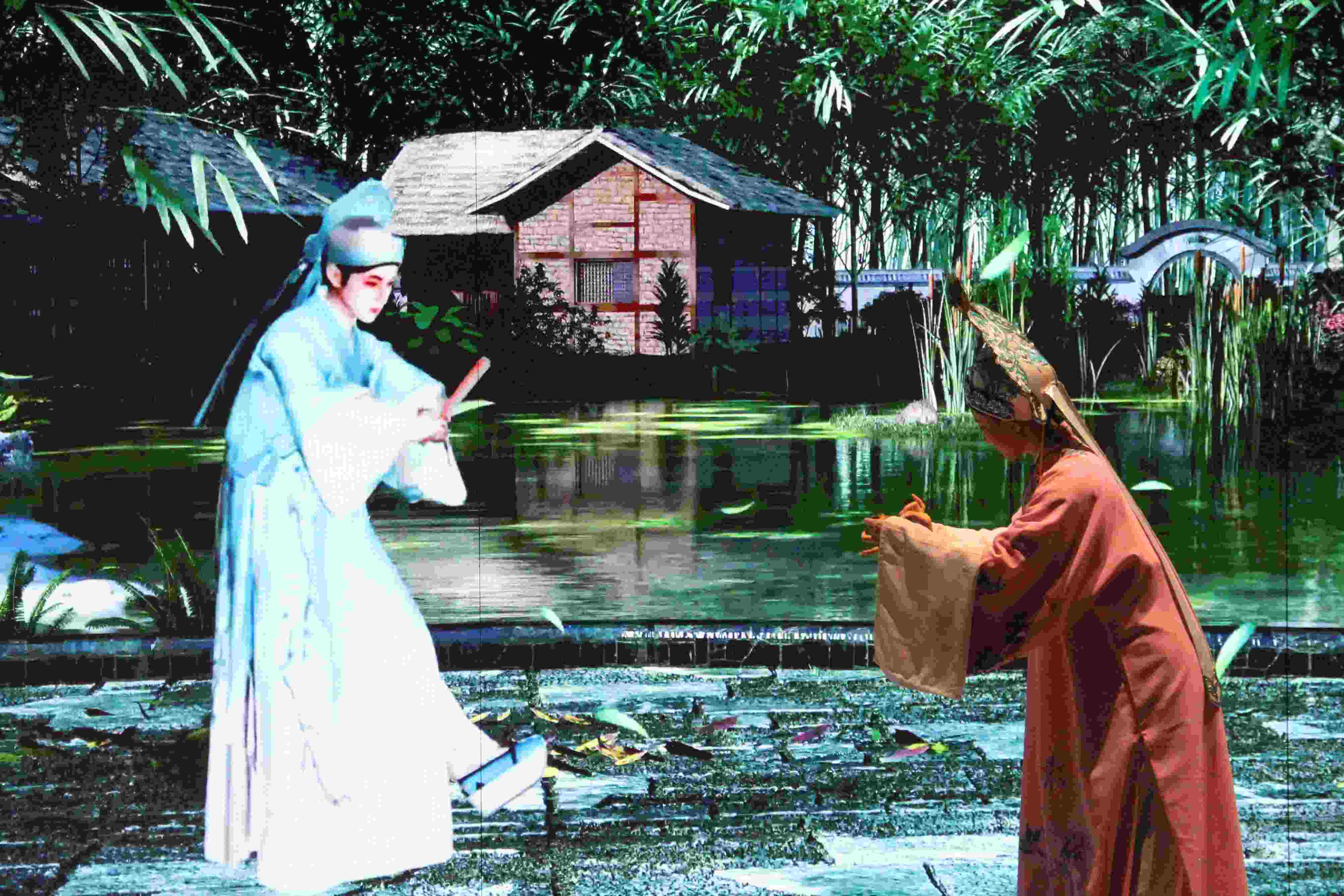 真人演員與虛擬人演員在“元啟金陵”南京數(shù)字文化客廳出演《梁山伯與祝英臺(tái)》經(jīng)典選段。受訪者供圖