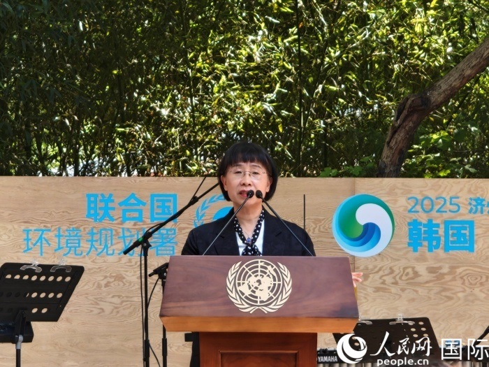 周國(guó)梅致辭。人民網(wǎng)記者 李明攝